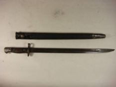 A 1907 pattern bayonet for a Lanchester sub machine gun: the blade stamped 'WSC 294 9-43' over a