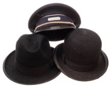 A black felt bowler hat,