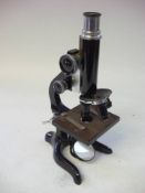 A black lacquer microscope by Ernst Leitz, Wetzlar: No 112973,