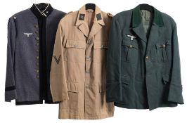 A group of six reproduction German uniforms.