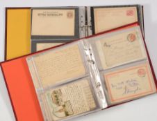 A collection of early stamp postal stationery: unused and used in two albums,