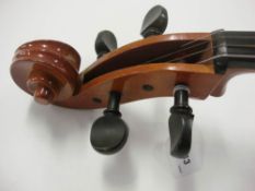 A 20th century German cello:, scroll carved headstock with ebony keys and fingerboard,
