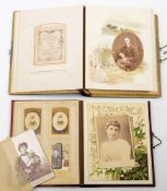 A late Victorian black leather Carte de Visite album dated 'Xmas 1894': containing various