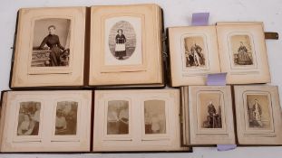 Four late 19th /early 20th century Carte de Visite albums: containing mostly family portraits,