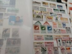 A Chinese stamp collection in stockbook and boxfile including Macao signed covers limited to five