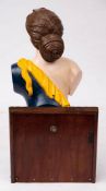 A late 19th century carved figurehead of 'Diana': with brown hair over painted face and blue dress