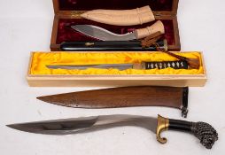 An Indian presentation kukri in case: the plaque inscribed 'With Best Compliments K A Nambiar,
