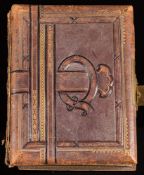 An Edwardian Musical Cabinet photograph album: playing 'Auld lang syne' with floral lithographed