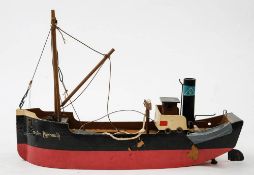 A mid 20th Century wooden clockwork coaster 'Plymouth': black funnel over wheel house,