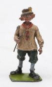 Britains Farm People No 587 'Village Idiot': in beige smock, green trousers and blue stockings.