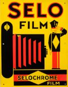 A Garnier Selmo Film enamel advertising sign for 'Selochrome Film': red and black on a yellow