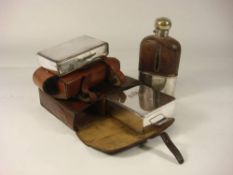 Two silver plated sandwich boxes in leather cases and a glass and silver plated drinking flask: (3)