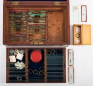 A late 19th /early 20th century mahogany microscope slide case and contents: mostly entomological