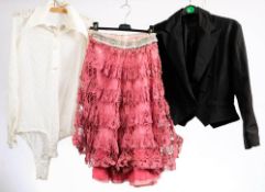A Christian Dior white cotton body suit together with a 1950s black silk and embroidered skirt by