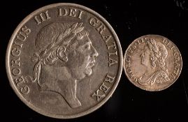 An 1815 George III 3 shilling bank token and a 1740 threepence.
