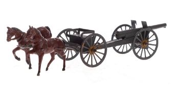 A French diecast 75mm gun, limber and two horses: 21cm long.
