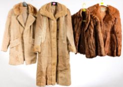 Two mid 20th century fur coats together with two horse hair coats.