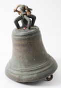 A bronze bell with crown top and suspension ring,: unsigned 32cm high.