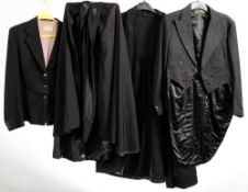 An early 20th century gentleman's black tail coat by A J Ridley & Sons:,