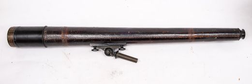 A War Department issue leather cased 3 inch compound telescope by Thomas Cooke & Sons Ltd,
