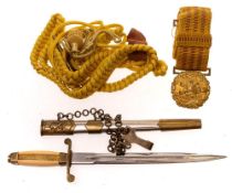 A Soviet Russian dirk: the flat double edged blade with single fuller over reversed brass quillons