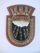 A ward room badge for HMS Jupiter: on wooden plinth, 23cm high.
