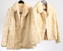 Two mid-20th century white fur jackets: (no labels).