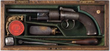 A rare cased percussion cap hammer sighted transitional six shot revolver by Joseph Bourne: the 5