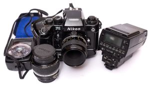 A Nikon F4 35mm SLR camera: with MB 21 battery pack, 55mm, F2.