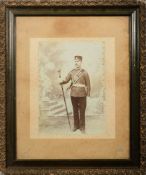 A collection of late 19th/early 20th century framed regimental photographs and portrait