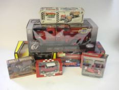 A group of various scale model vehicles: including a 1/16th Highway 61 Chevrolet 1941 Pumper