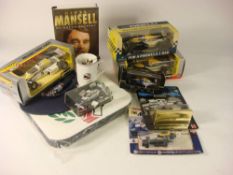 A collection of Nigel Mansell memorabilia: including a signed 1992 British GP programme,