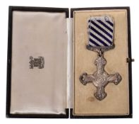 A George VI Distinguished Flying Cross dated 1941,: in case of issue.
