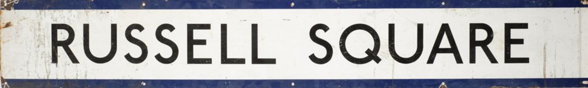 A London Underground enamel frieze sign 'Russell Square' by Garnier: 23 x 150cm.