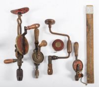 A group of three hand drills,