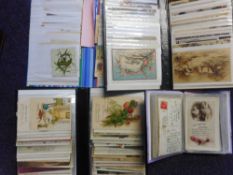 A collection of Edwardian and later postcards: includes Christmas,