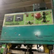 Signode Automatic stretch wrapper with 10 ft infeed powered roller conveyor and 10 ft outfeed roller