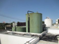 Damrow 15,000 gallon capacity refrigerated silo tank, with interior distortion. 1.5 HP horizontal