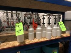 (8) SOAP OR PRODUCT DISPENSERS WITH S/S PUMP HEADS, BELIEVED TO BE NEW