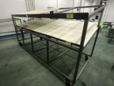 S/S PACK-OFF TABLE, PORTABLE/MOUNTED ON CASTERS, UMHW CUTTING BOARD TOP (HALF MISSING) AND BOTTOM