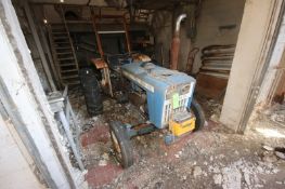 Ford 1000 Tractor with Rear Mower Attachment (LOCATED IN Muenster, TX)