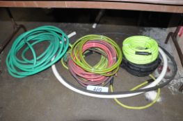 Lot-Water and Air Hose on Floor Under (1) Table