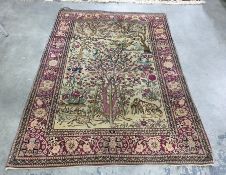 Eastern-style rug, the cream ground central field with Tree of Life decoration featuring various