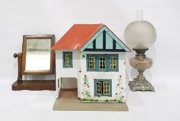 Doll's house, mirror and an oil lamp