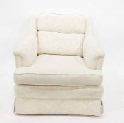 Single cream ground armchair retailed by Harrods