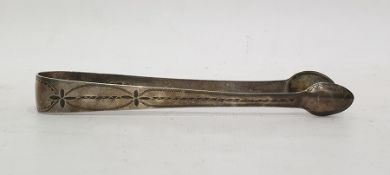 Pair of Georgian silver sugar nips, bright cut decorated (hallmarks rubbed)