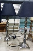 Pair silver coloured metal table lamps, with another (3)