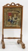 19th century firescreen with needlework decoration featuring couple at window