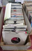 Three boxes of assorted 45rpm singles by various artists, to include The Bee Gees, Bonnie Tyler,
