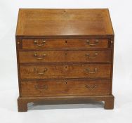 19th century oak bureau, the fall front opening to reveal assorted drawers, and secret drawers above